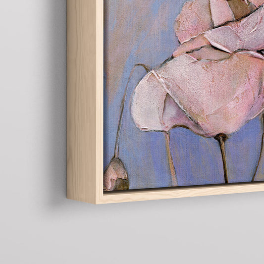 Close up detail of framed poppy print on canvas in a natural wood float frame.