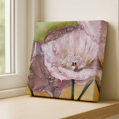 Floral painting on a wooden surface with a window in the background
